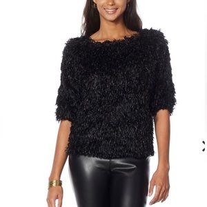 G by Giuliana Black Label Feather Top
Shimmy and shake with a chic feathery top